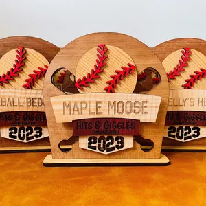 Multi-layer laser cut trophies for a fantasy baseball league made out of various solid wood.
